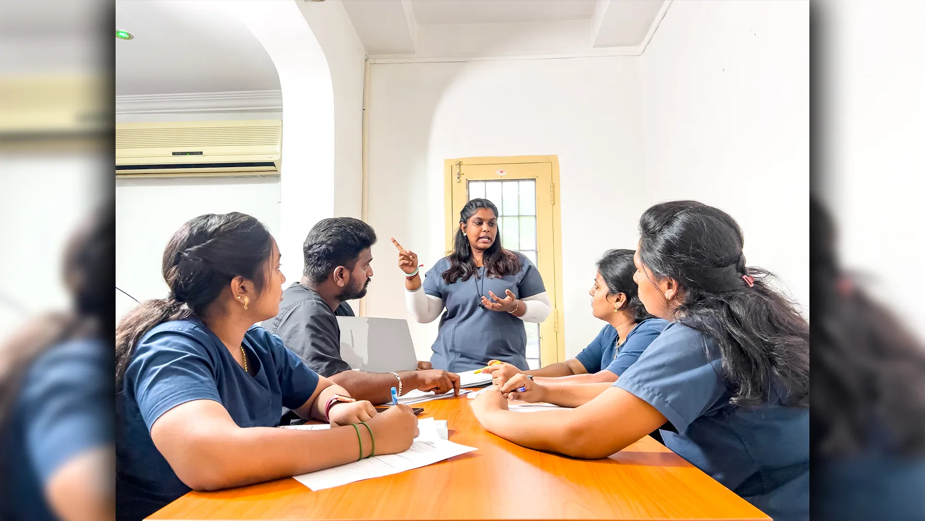 Vasudharany, MSLP, leading a speech therapy review session at DARC