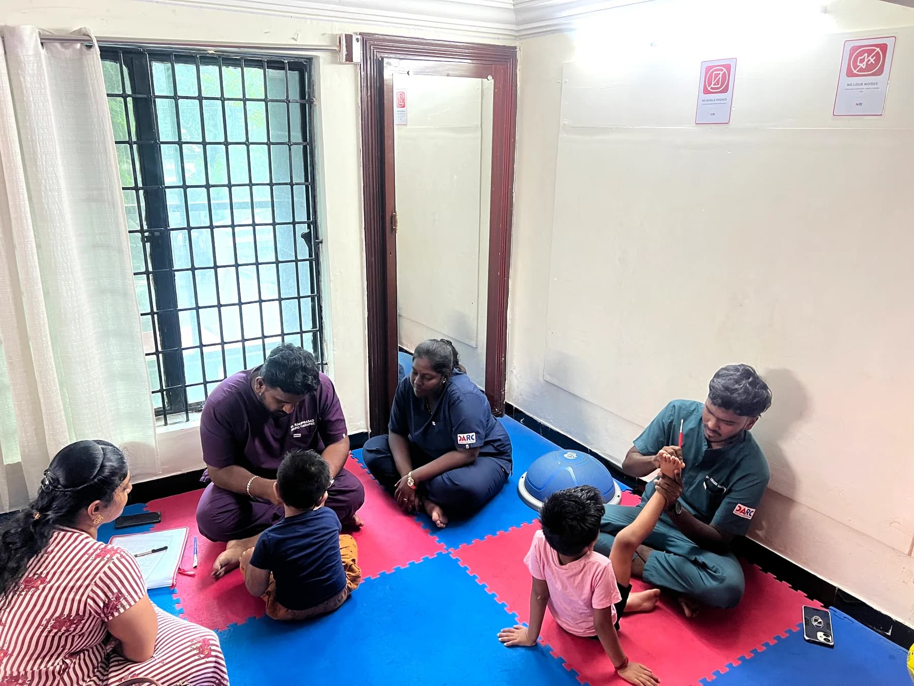 DARC therapy room with therapists and children