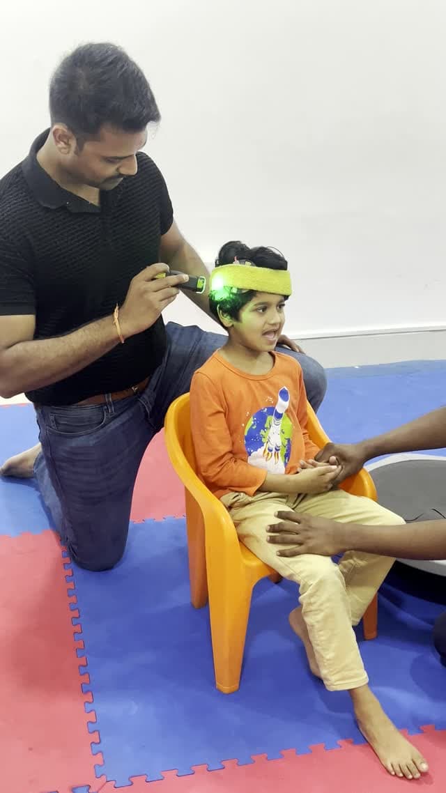 Supervised low-level light therapy session with protective clinical oversight